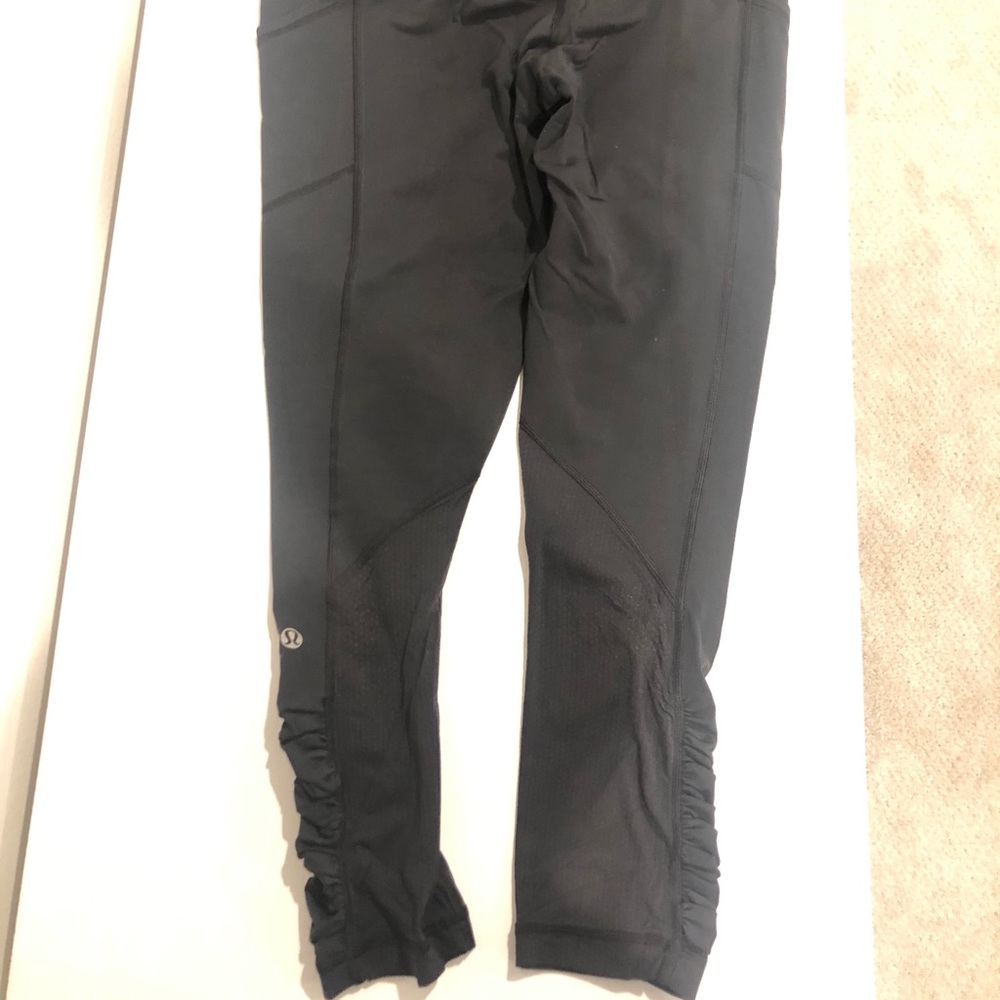 Classic black Lululemon crops with ruffles